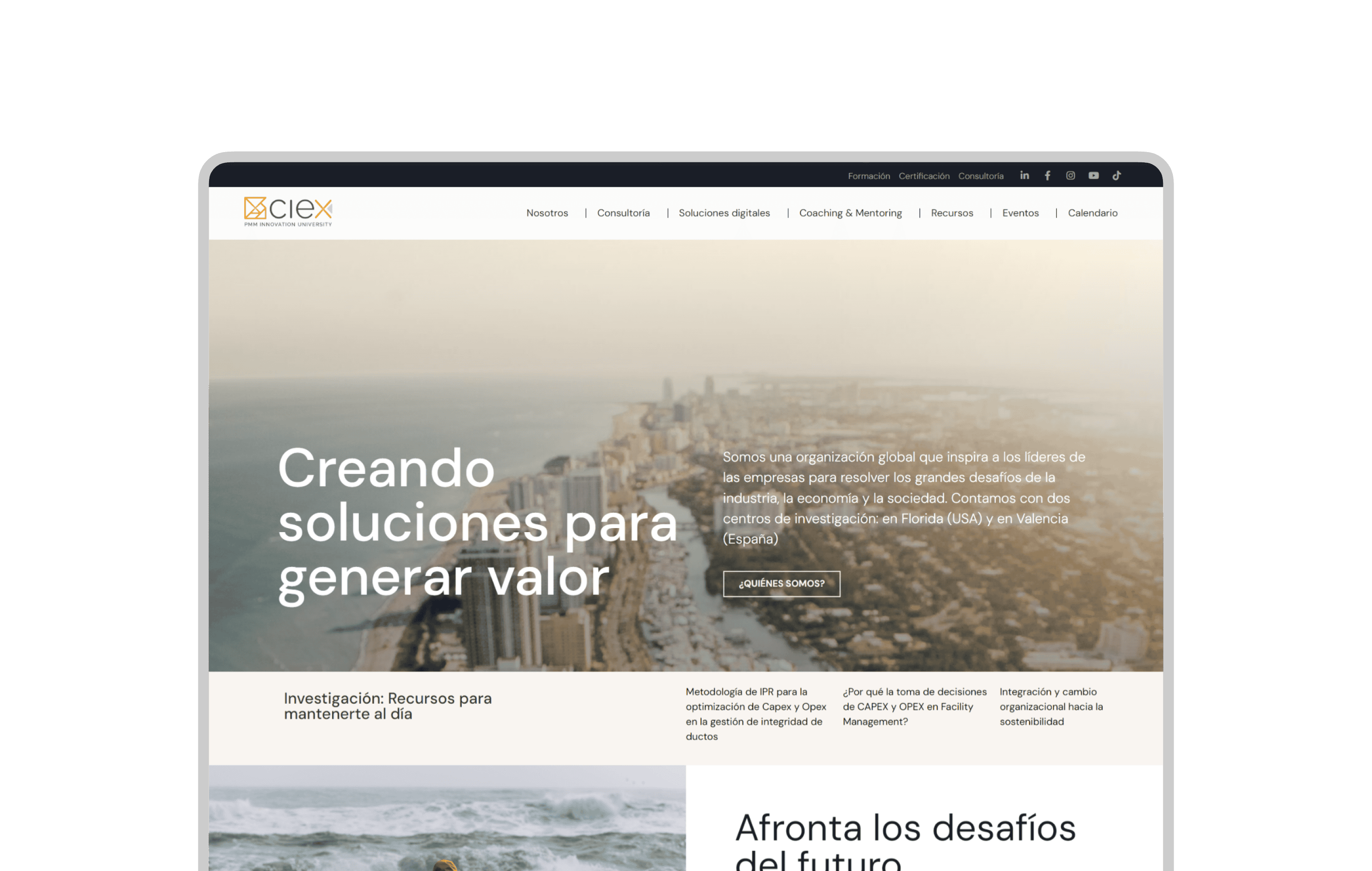Home de la nueva web de PMM CIEx: «Creando soluciones para generar valor» sobre una vista aérea de la ciudad
